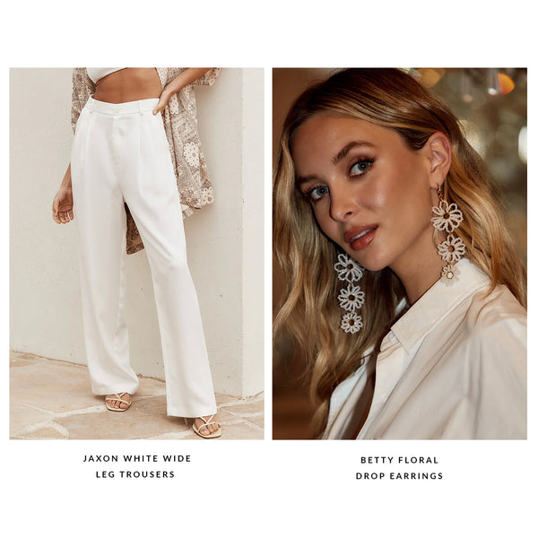 Jaxon white wide leg trousers paired with Betty floral drop earrings for a bridal look.