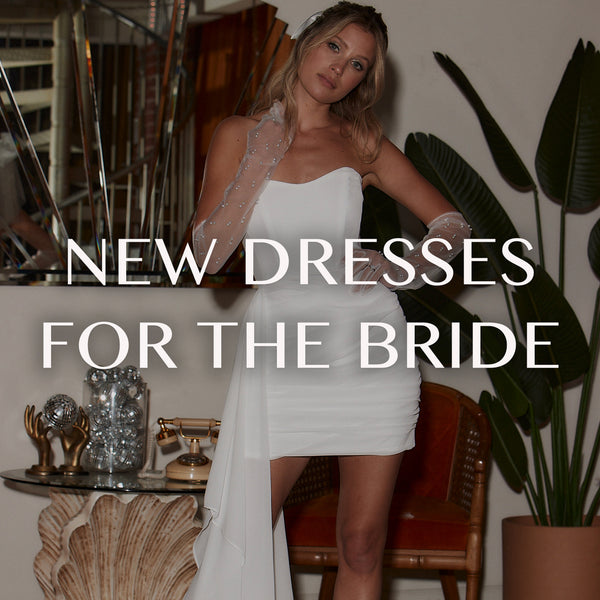 White one-shoulder bridal mini dress with sheer embellished gloves, captioned New Dresses for the Bride.