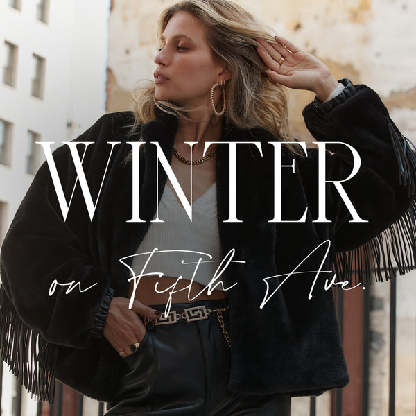 Winter on Fifth Ave blog header: black fringe faux fur jacket styled for a chic city winter outfit.
